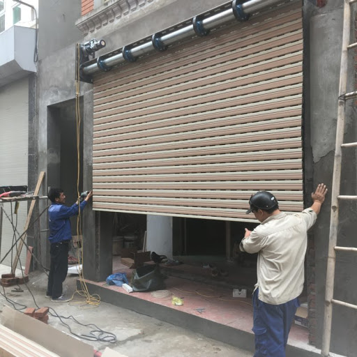 Sửa cửa cuốn bị kêu do lò xo trợ lực kém